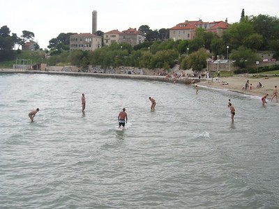 people playing ball in water