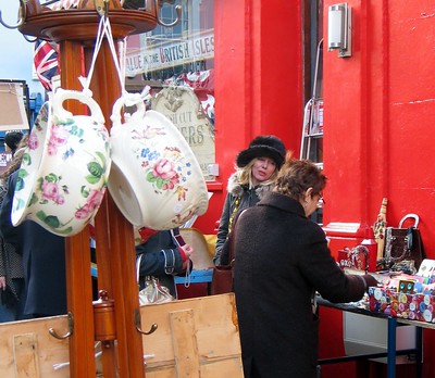 two people looking at antiques