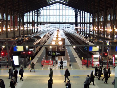 People walking through train station