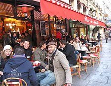 A Paris café in winter. Taking in the festive scene at a café
