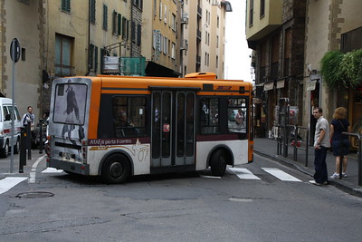 orange electric mini bus in Florence