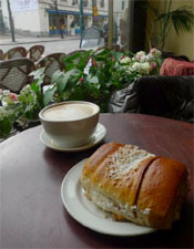 A cinnamon roll and coffee at Cafe Esplanad.