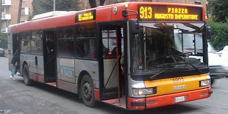 red and orange bus in rome