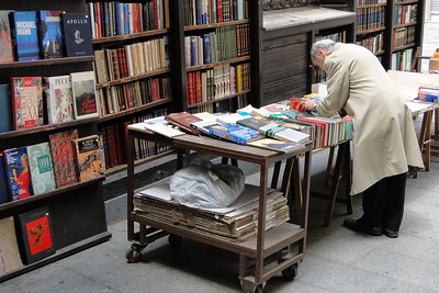 person looking at books