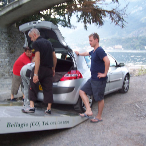 Getting on tow truck.