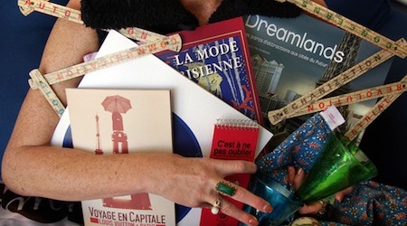 person holding guidebooks