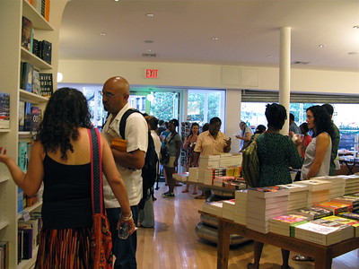 people looking at books in a bookstore