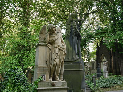 statues in Olsany Cemetery, Prague