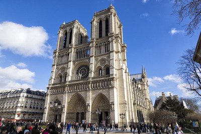 crowds of people outside Notre Dame