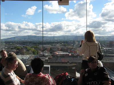bar dining area with glass walls revealing views of Dublin