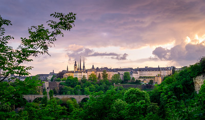 sunset over historic Luxembourg City skyline