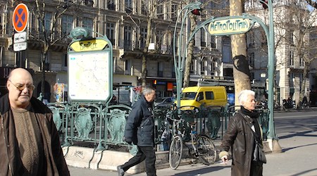 people walking near metro in Paris