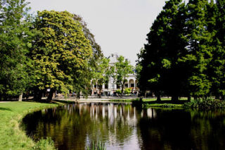 lake and old building in Vondelpark