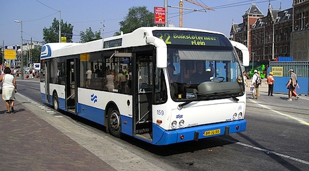blue and white bus in Amsterdam