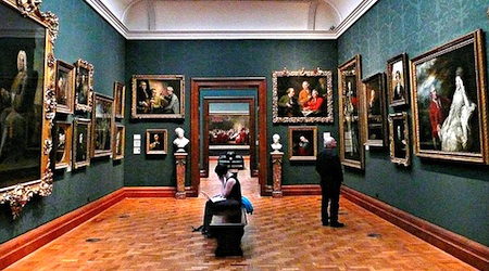 National Portrait Gallery interior, green room with several framed paintings, one of our favorite free art museums in London
