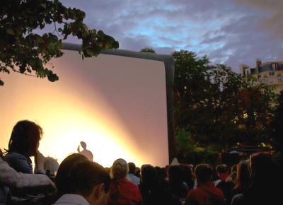 large move screen in outdoor park setting