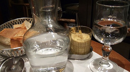 pitcher and glass of water on table