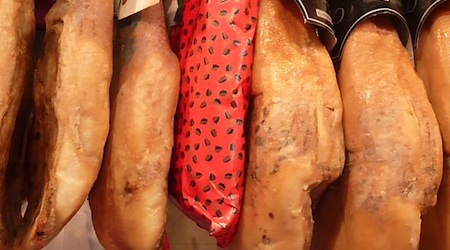 hanging hams at market