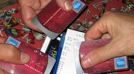 people holding credit cards