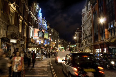 London theater district lit up and bustling at night
