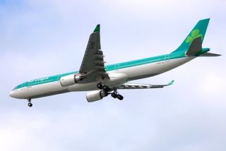 Aer Lingus plane flying in sky