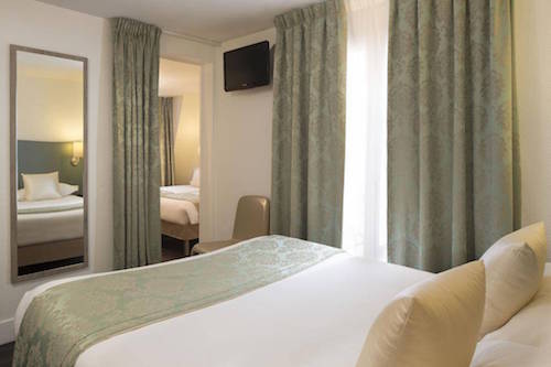 Snuggle up in a chic room at Republique Hotel.