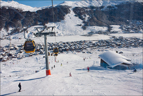 Riding the lift up the trails of Livigno, Italy. Photo: Peter