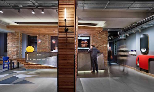 The lobby and check-in desk at Generator Hostel London.