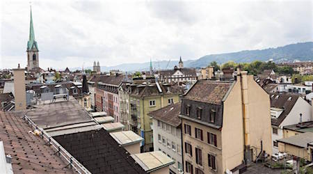 view of rooftops in Zurich from Hotel Marta window