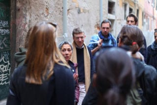tour guide with tourists