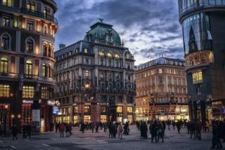 Vienna city square lit up at dusk