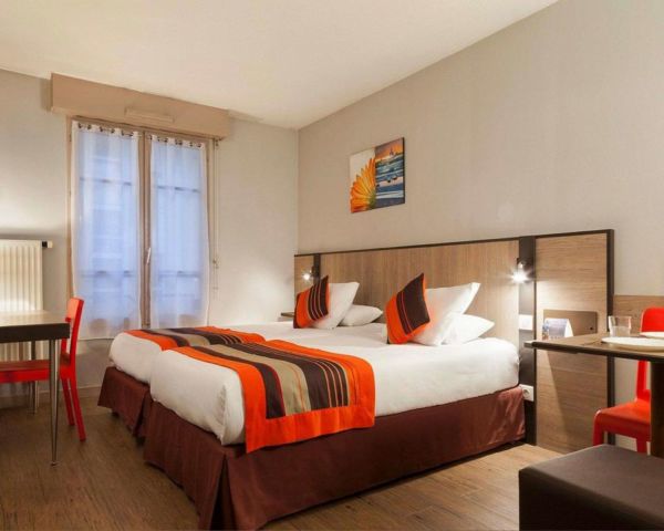 brown and orange hotel room