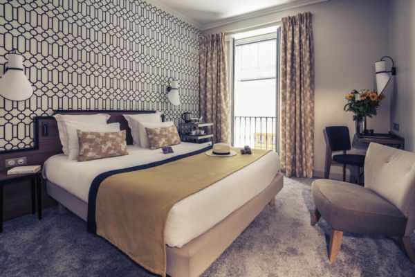 modern black, white and beige hotel room