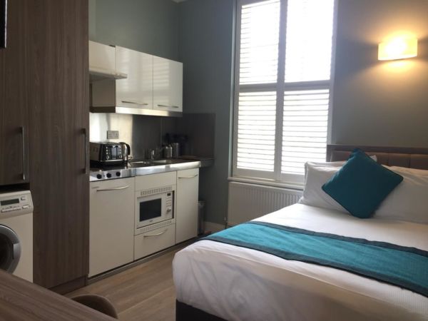 hotel room with kitchenette