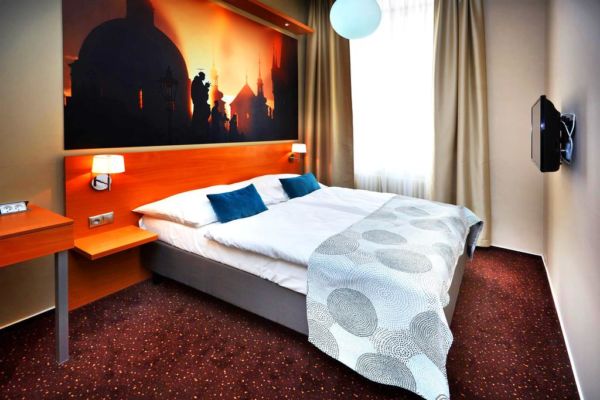 hotel room with large wall mural