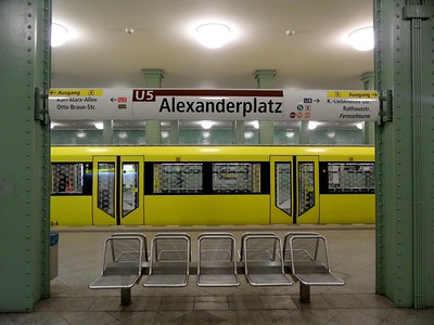 yellow subway at Alexanderplatz stop in Berlin