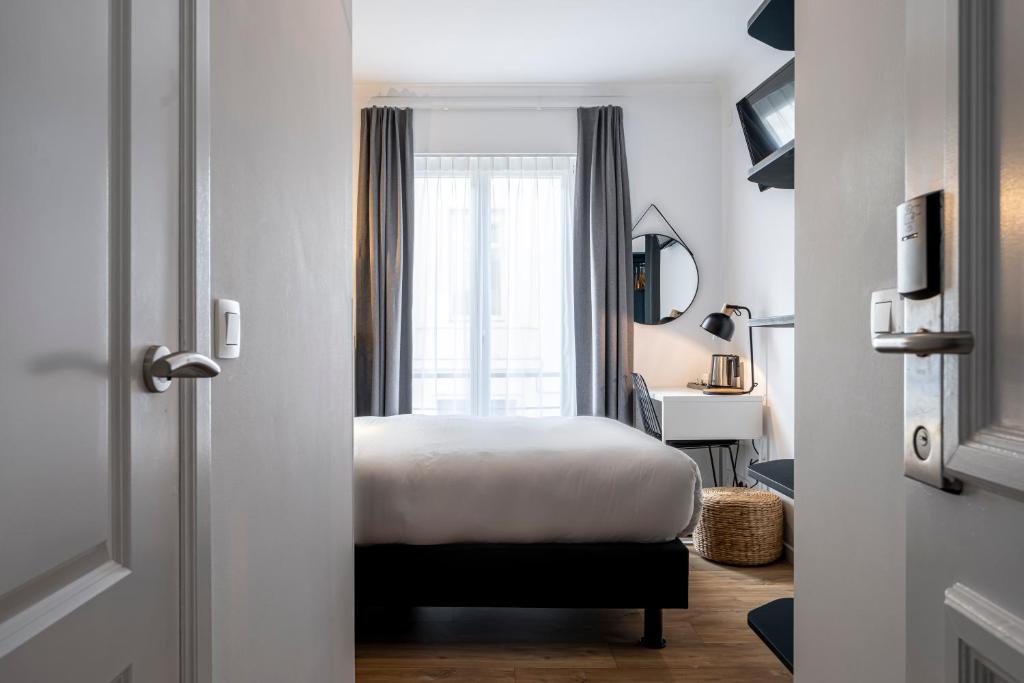 white and gray hotel room