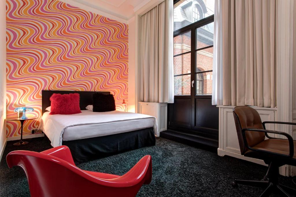 pink and red room with wavy patterned wall