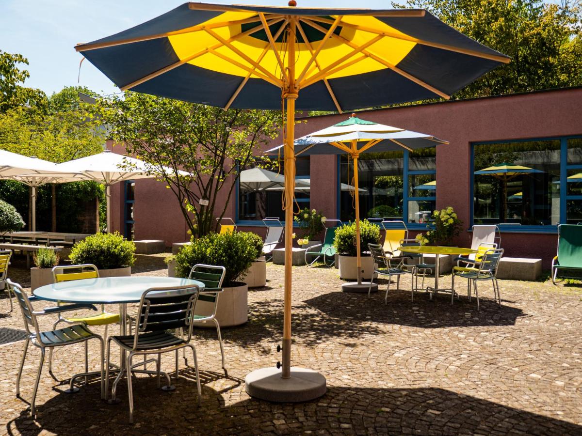 patio table with umbrella at Zurich Youth Hostel