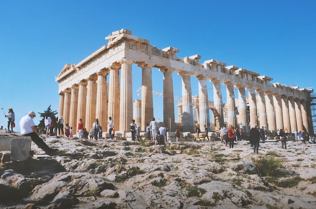 crowds of people in front of Parthenon in Greece
