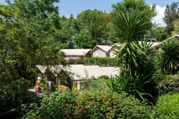 Row of chalets at hu Roma Camping In Town campsite in Rome