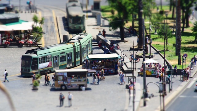 green tram vehicle in Rome